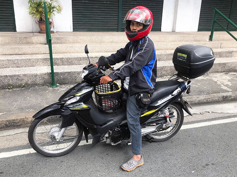 delivering food on a motorcycle