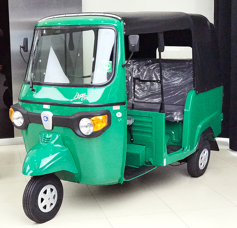 Grab teams up with Piaggio for premium tricycle service | VISOR