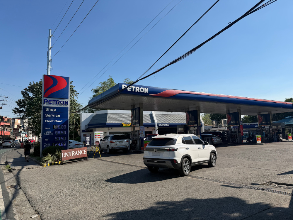 A petron gas station in Manila on a sunny day