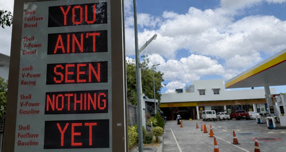 Shell station in the Philippines with AI altered pricing board saying You Ain't Seen Nothing Yet