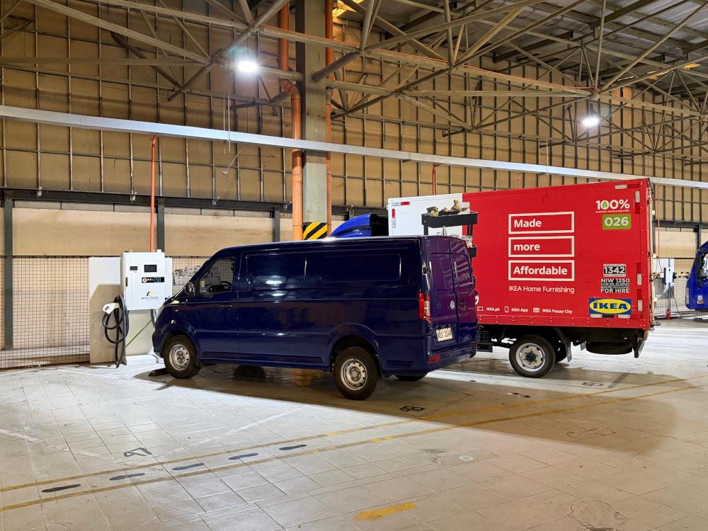 A van and a truck charging that Mober's facility in Pasay.
